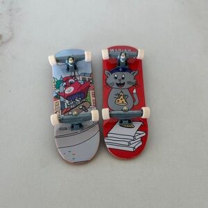 Mariah Cartoon Finger Skateboards - Red and Blue
